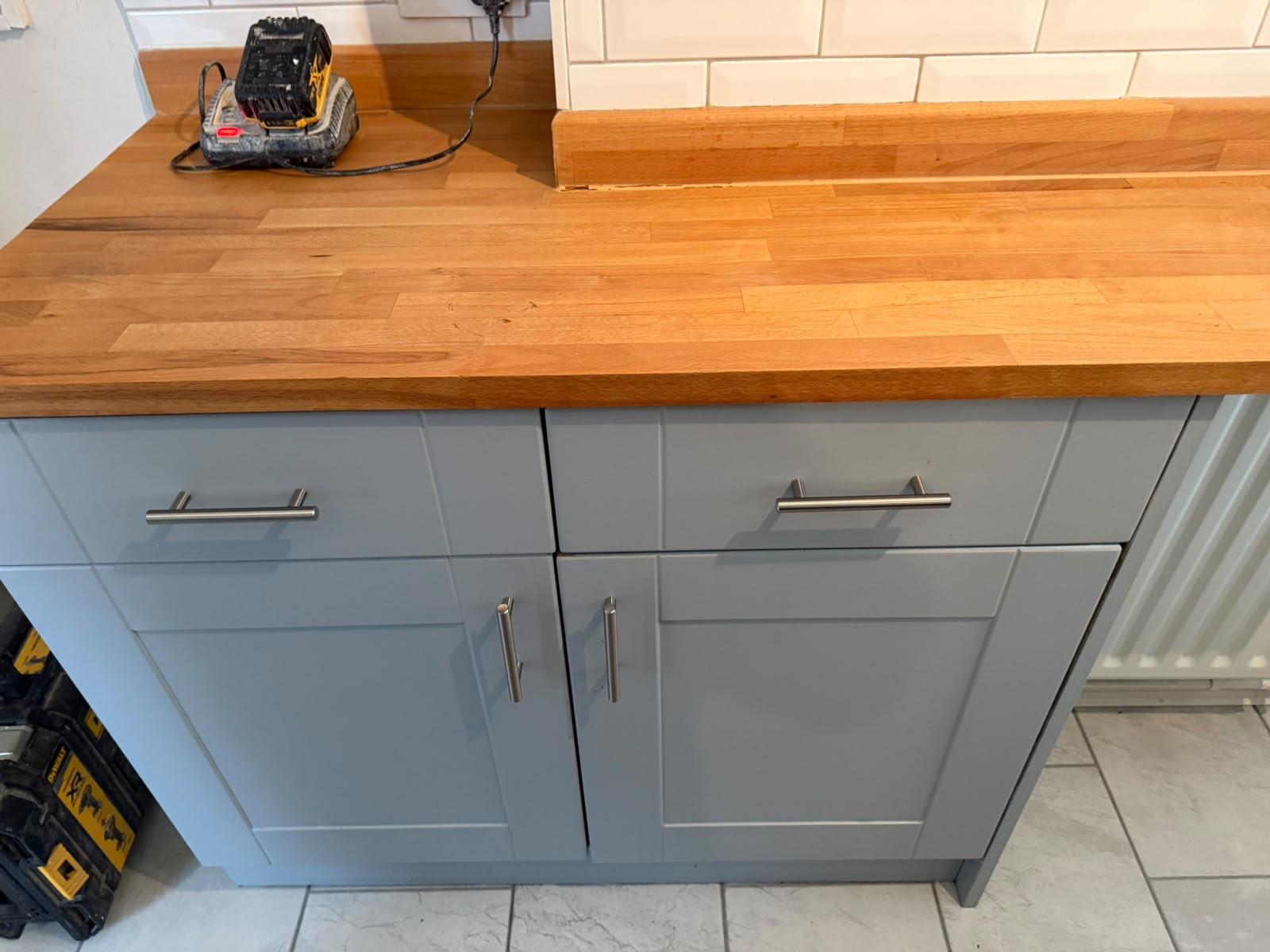 Fitted kitchen units and solid oak worktop installed