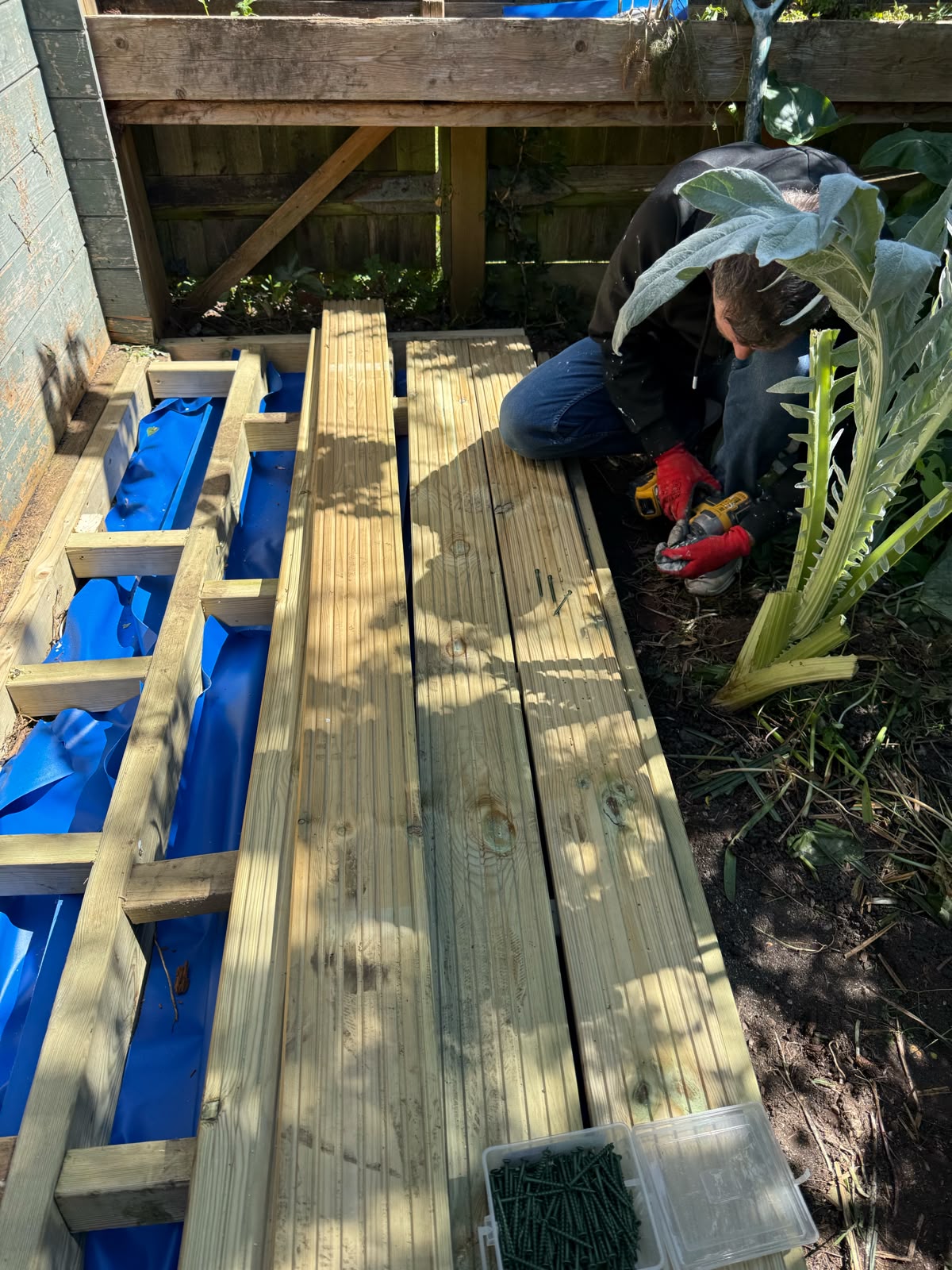 Decking subframe being built in a rear garden